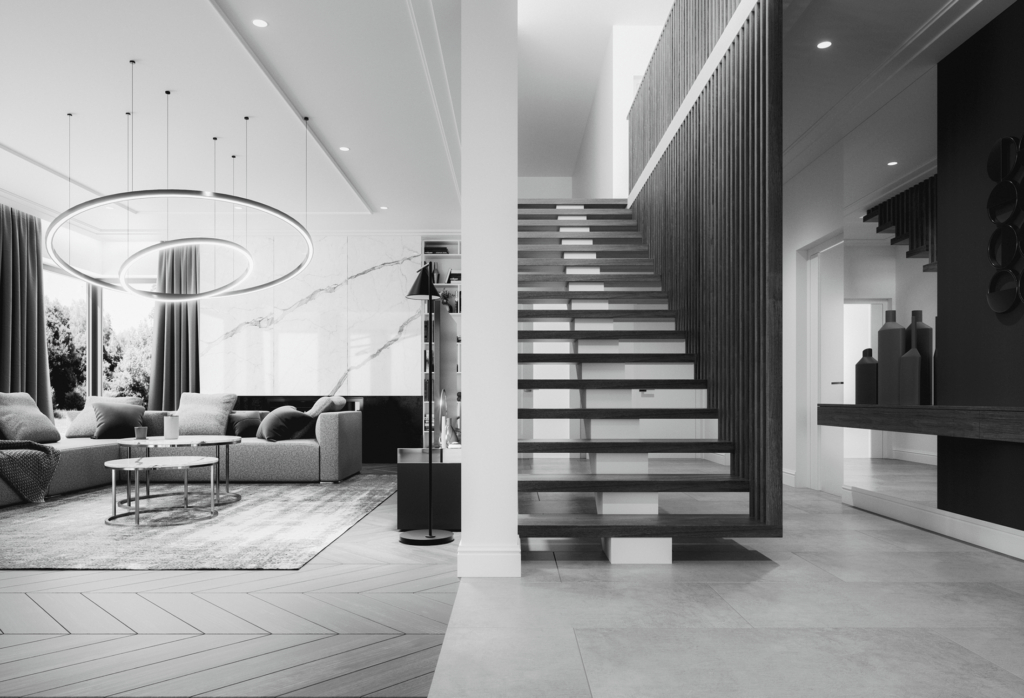Spacious modern room with stairs leading upstairs and a living room on the left